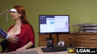 Redhaired babe shows off big tits before office hammering