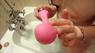 My sexy girlfriend is playing with her toys in the shower