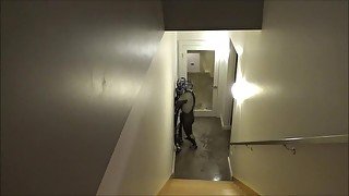 wetsuited cyborg captures cyborg in apartment and humps him