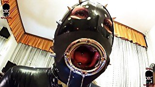 Latex cock for tunnel gagged latex slut slave