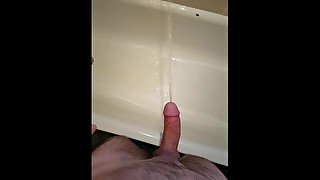 Pissing then a huge cumshot