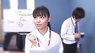 Japanese nurse Aino Kishi drops on her knees to suck a dick