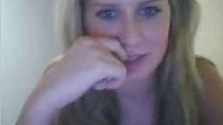 Charming blue eyed webcam girl flaunts her big natural tits