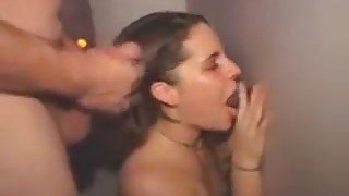 Brunette Amateur Sucks Multiple Dicks Through Glory Hole