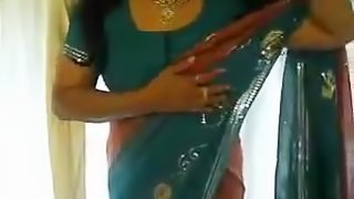 British Indian wife gives sexy strip. cum on tits