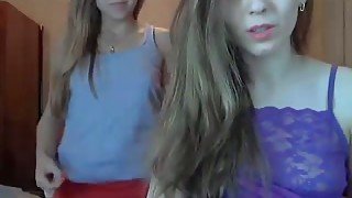 Two cute Russian teens posing seductively on webcam