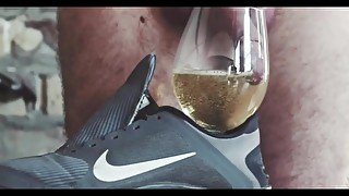 Stunning young cock pissing and masturbating on Nike sneakers