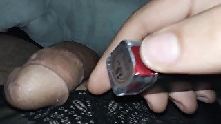 A man wearing lingeries and makeup masturbates and anal fisting untill he cums hard