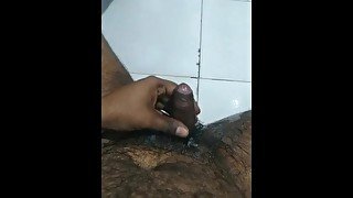 Desi boy rubbing his dick in bathroom