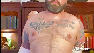 TattedRockerbear strips and cums