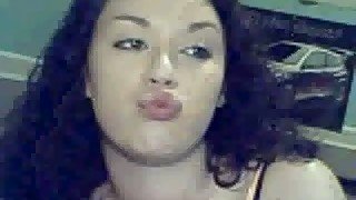 Abit plumpy curly haired brunette flashing her tits on webcam