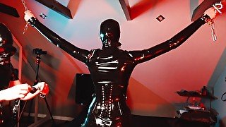 German Latex Slut is Bound and gagged and gets a spanking session