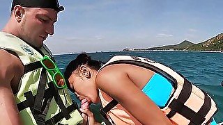 Skinny amateur Thai teen Cherry giving blowjob on a jet ski outdoor