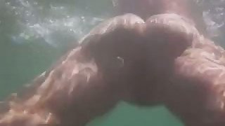 Homemade video with my wife bathing nude in a lake