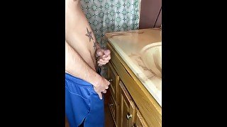 Tattoo’d skinny guy rubbing one out