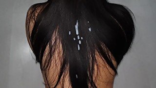 Sexy slender brunette gets cum on luxurious hair