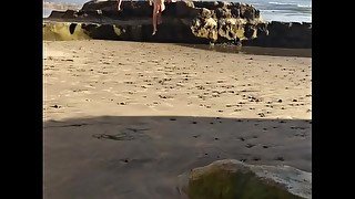 Two longhair bros showing off their dongs at the beach in Australia.