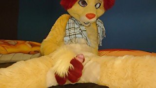 Lion fursuiter moans and cums