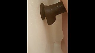 Fucking my huge black dildo in the shower