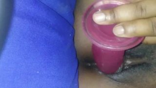 ebony chick fucks pink dildo