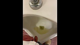 Pissing and jerking in public urinal