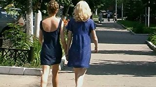 Lovely lesbian teens take a walk before having passionate sex