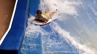 Sexy flowrider is demonstrating her downblouse in aqua park