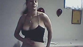 Busty and a bit chubby webcam brunette showing off her juggs