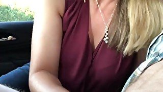 HOT BABE STROKING A COCK IN THE CAR