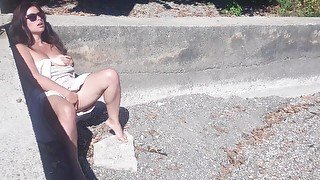 Sexy risky girl hid and masturbates on a public beach