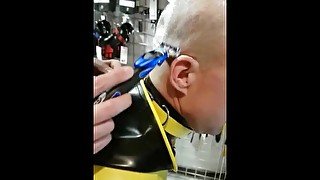 Headshave Slave in Rubber