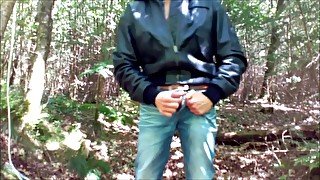 Hot leather man allone in the woods...