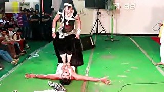 Indian Lady Trampling Man in Dance in Public