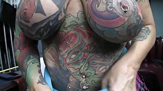 Mature Tattooed MILF Shows Off Her Huge Tits