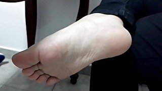 I show my foot while giving it a light massage