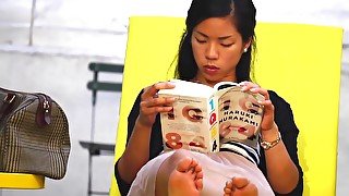 Beautiful Asian Girl Reveals Incredible Feet As She Reads Book In Public