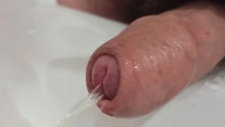 Foreskin pissing and playing. Close up POV