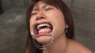 Slutty asian redhead eating two dicks gets mouth cummed