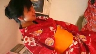 Amateur Asian girl strips and demonstrates her tits and holes