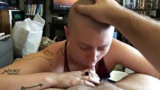 Shaved head girl sucks dick and chokes on huge cum load