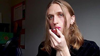 Tgirl slobbers on a dildo and fucks herself