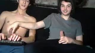 Two beautiful young guys masturbate together on the webcam