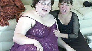 Disgusting fatso gets straponed smiling brunette MILF