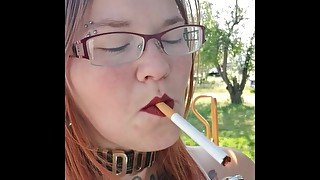 Sexy MILF having fun while smoking