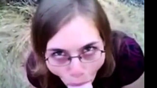 Nerdy Chick Sucks A Big White Dick In The Great Outdoors