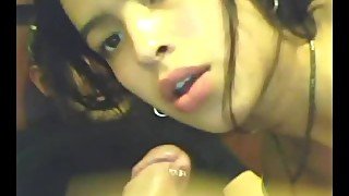 Latina beauty sucks her boyfriends pierced cock