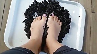 Small soft latina feet playing with dirt 1