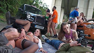 Hot Orgy With Depraved Chicks Right On The Street