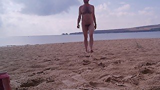 Walking naked out of the sea at nudist beach - Rockard Daddy