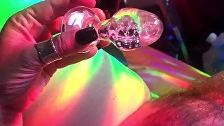 Cougar uses glass glow toy with rainbows on her fat pussy, anal and oral